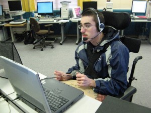 Job Focus Participant working on a computer with a headset Job Focus Participant working on a computer with a headset