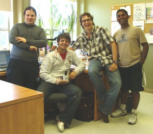 Katimavik Youth Max posing with Neil Squire Society Staff Ryan, Chad and Munesh