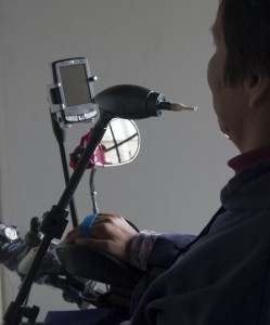 person with a disability using an accessible cell phone