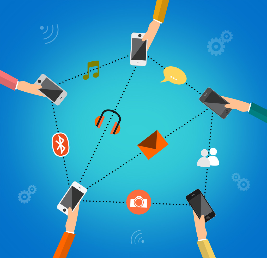 Illustration concept for mobile apps - People communicating through mobile devices
