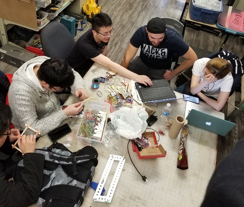 SFU capstone team working on exo-skeleton arm
