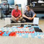 Fawzan, Director of Innovation, Chad Leaman, and printed parts