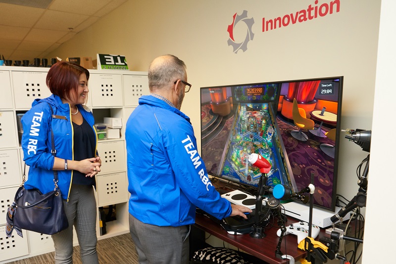 RBC volunteers demoing our adaptive gaming set-up