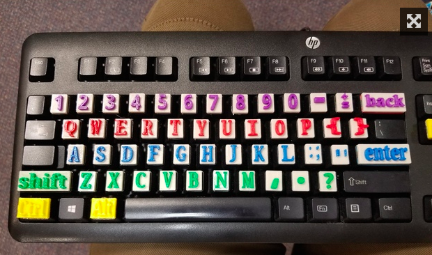 This is a Keyboard with raised keys to help users to use a keyboard