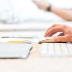 close-up of person's hand using a computer mouse