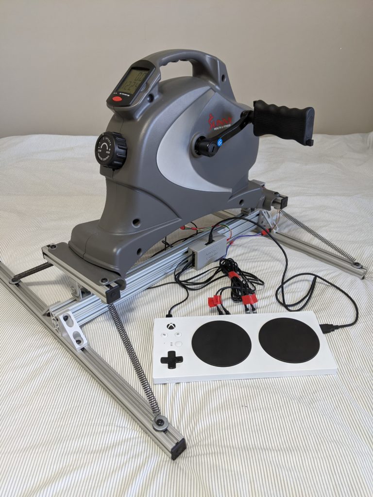 Image of an adapted arm cycle for use with an Xbox Adaptive Controller