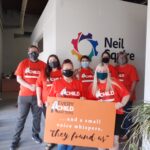 Neil Squire Regina staff wearing orange 