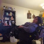 WorkBC Assistive Technology Services participant Vanessa in her wheelchair fitted with accommodations.