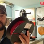 Jake holding a roll of filament for 3D printing