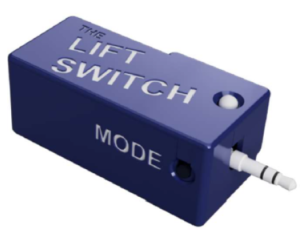 Rendered image of Lift Switch. The Lift Switch has a 3.5mm input on one side and a 3.5 mm output plug on the other end. An indicator light is on the top and a mode button is on the side.