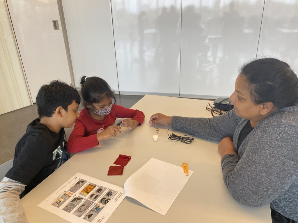 a family works together on a switch