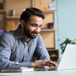 a man using a laptop