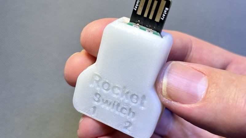 a hand holding a Rocket Switch