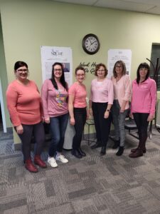 our staff in New Brunswick wearing pink