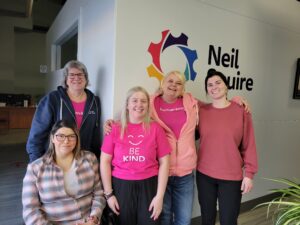 Our Regina office wearing pink