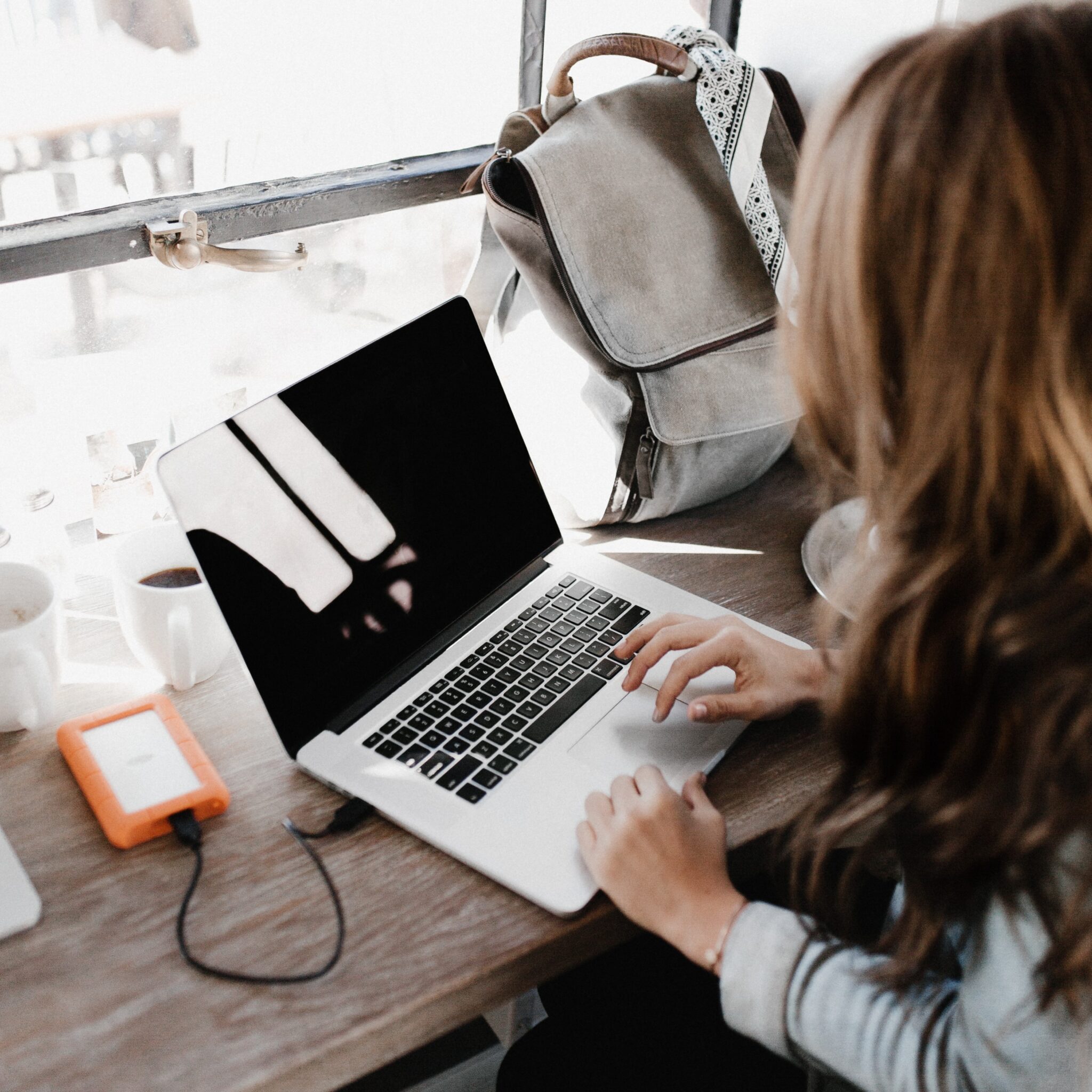 a woman using her laptop