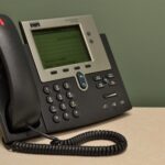 A landline phone in an office.