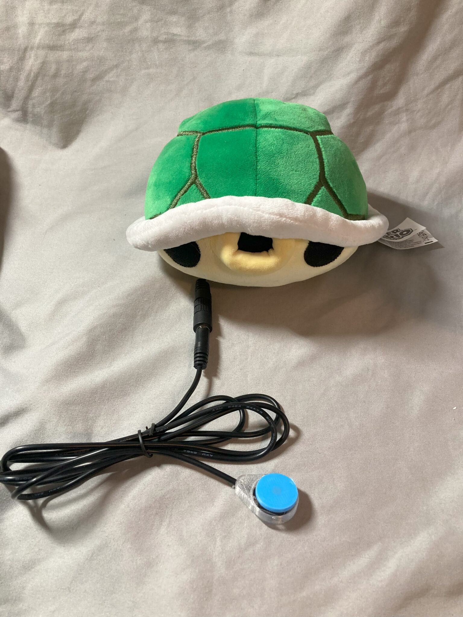 A switch adapted green Koopa shell.