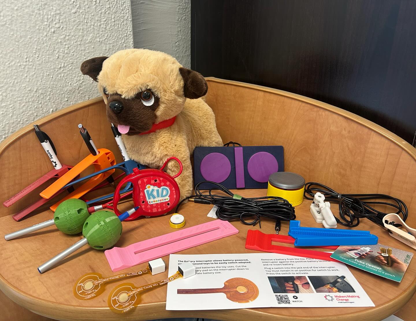 A selection of adapted toys, switches, and devices that were donated to ECIP Regina.