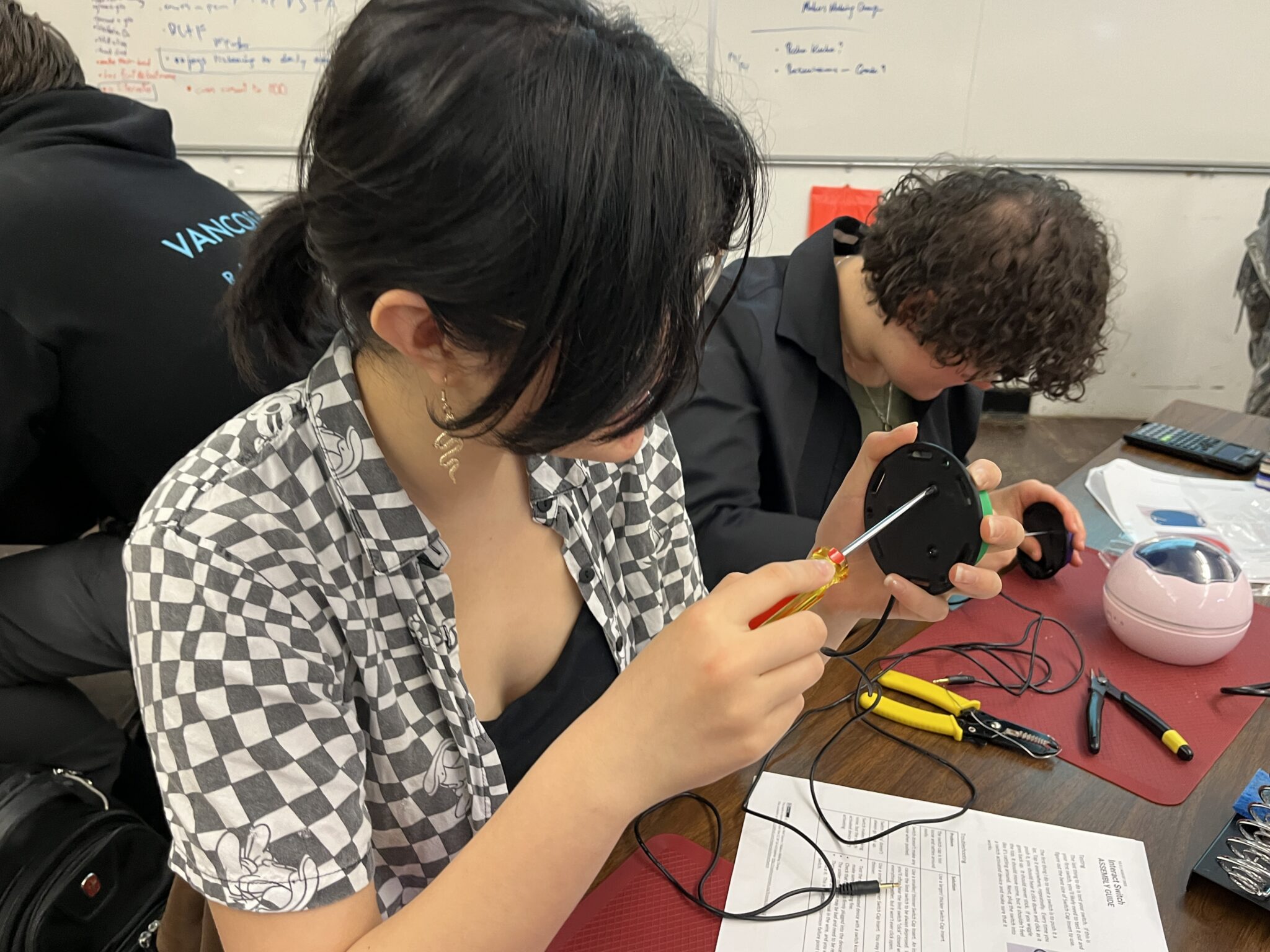 Two students working on their switches.