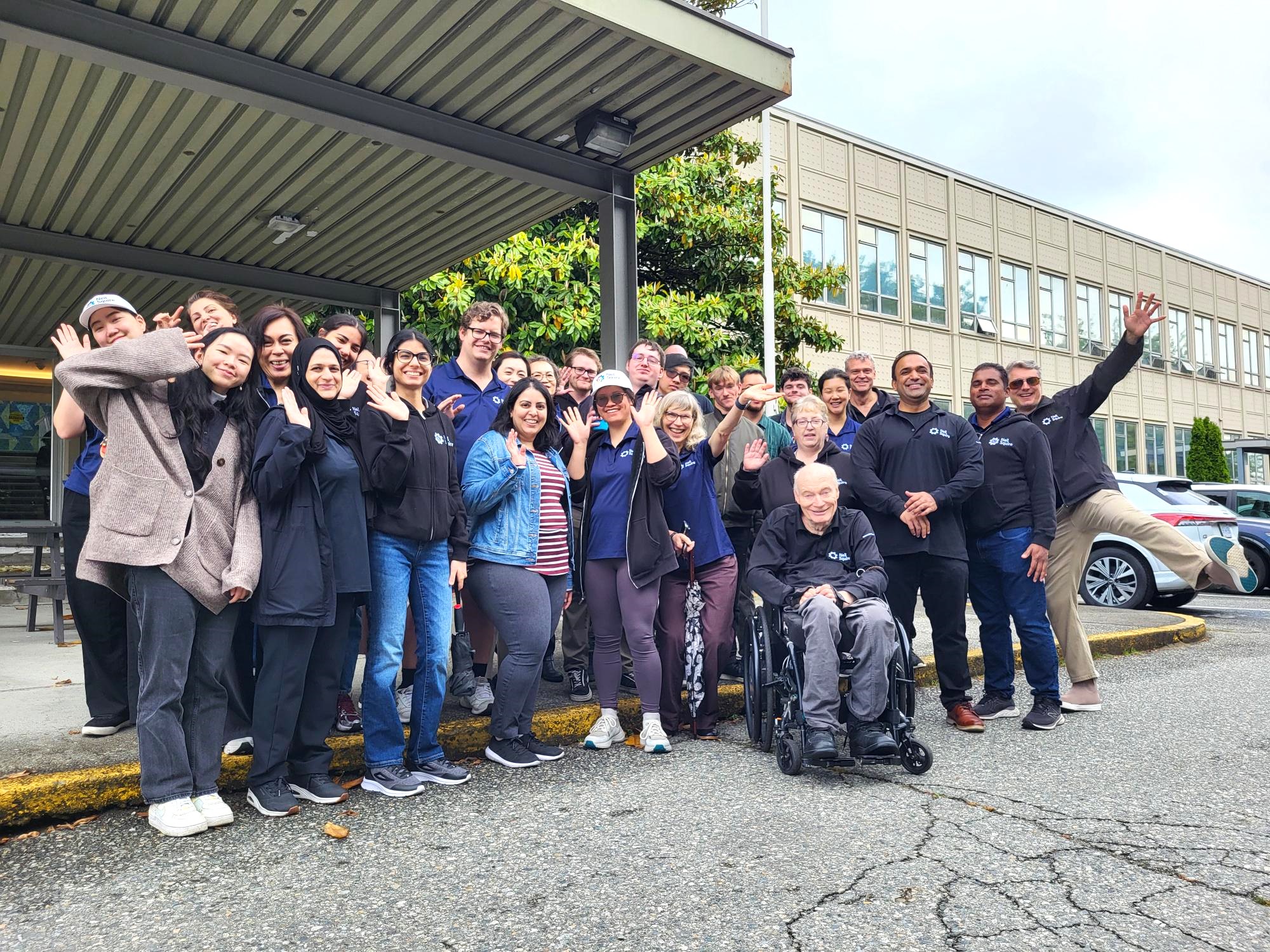 A big group of the Neil Squire Burnaby staff in front of the old office.