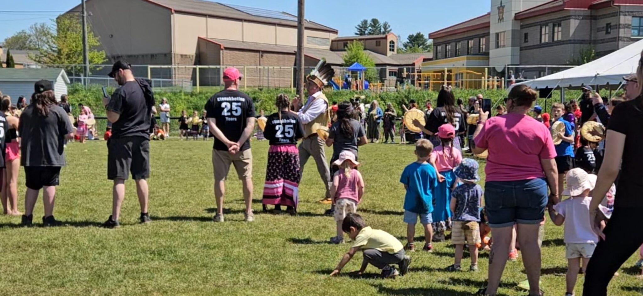 A community gathers at the Chief Harold Sappier Memorial Elementary School powwow.