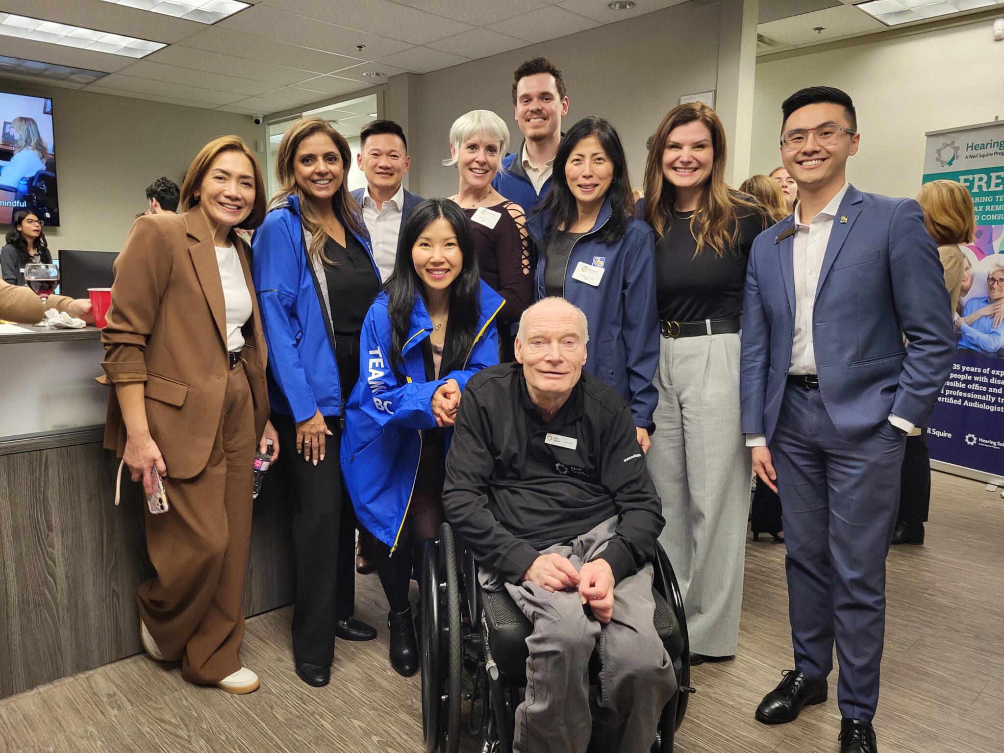 RBC staff members, Burnaby Board of Trade president and CEO Angie Whitfield, Neil Squire Executive Director Gary Birch pose for a photo at the After Hours Mixer.