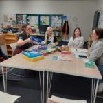 Amanda and Chelsea demonstrating items in the kit to Yellowknife school staff.