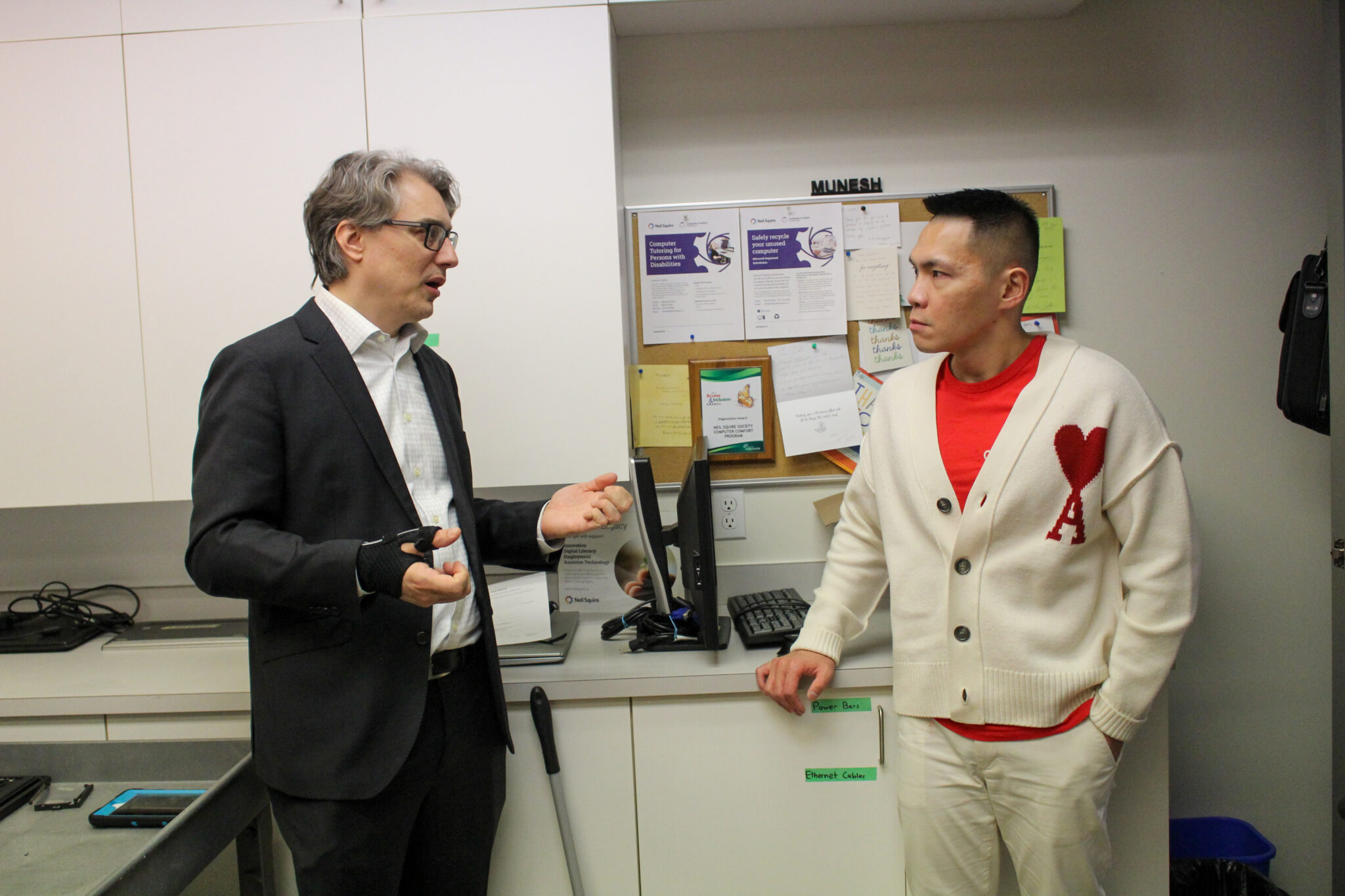 Director of Innovation Chad Leaman talks with MP Wade Chang.