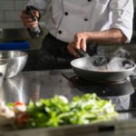 A chef works in the kitchen.