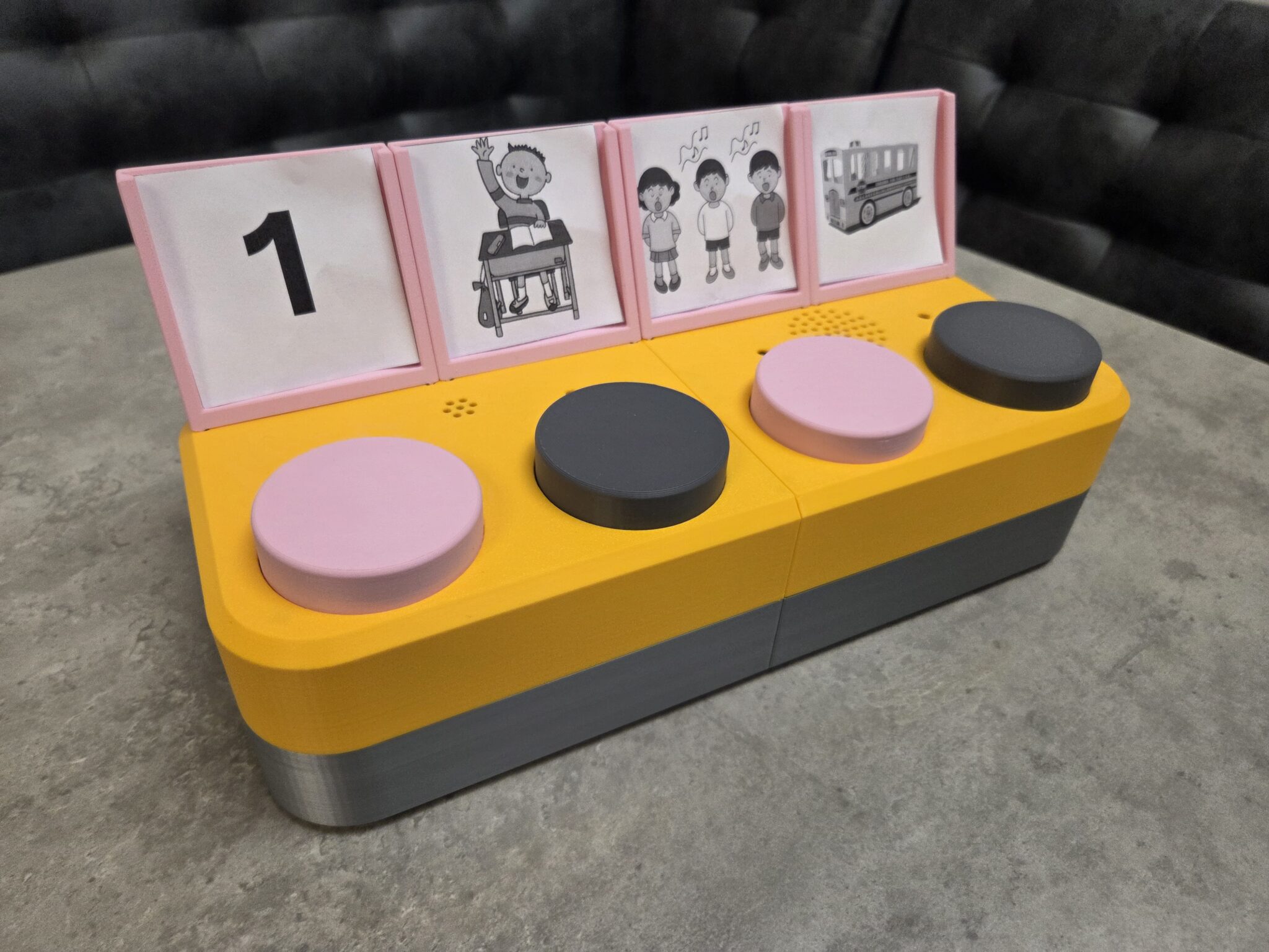 The Chatterbox, with 4 internal switches and picture diagrams for four messages.