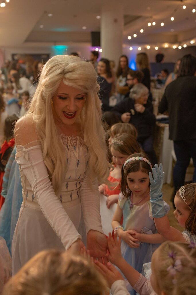 A princess greets the kids.