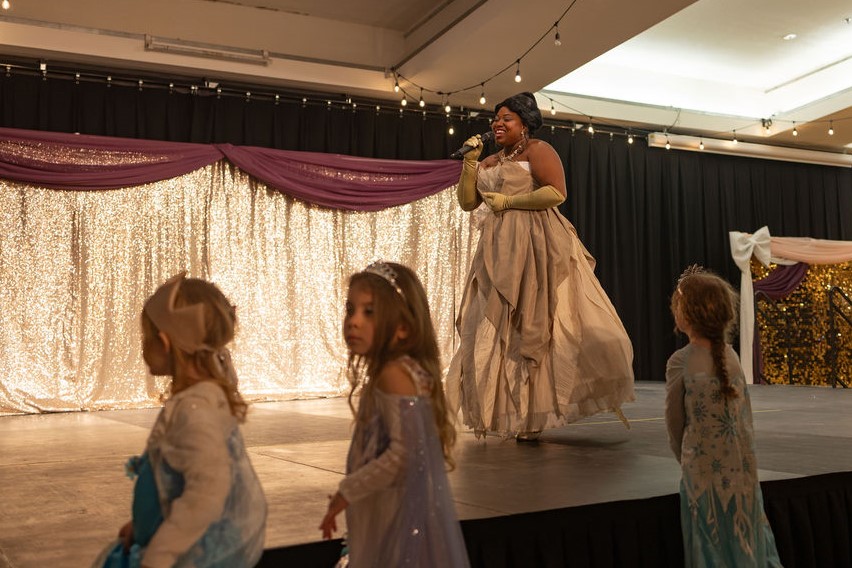 A performer performing to the crowd.