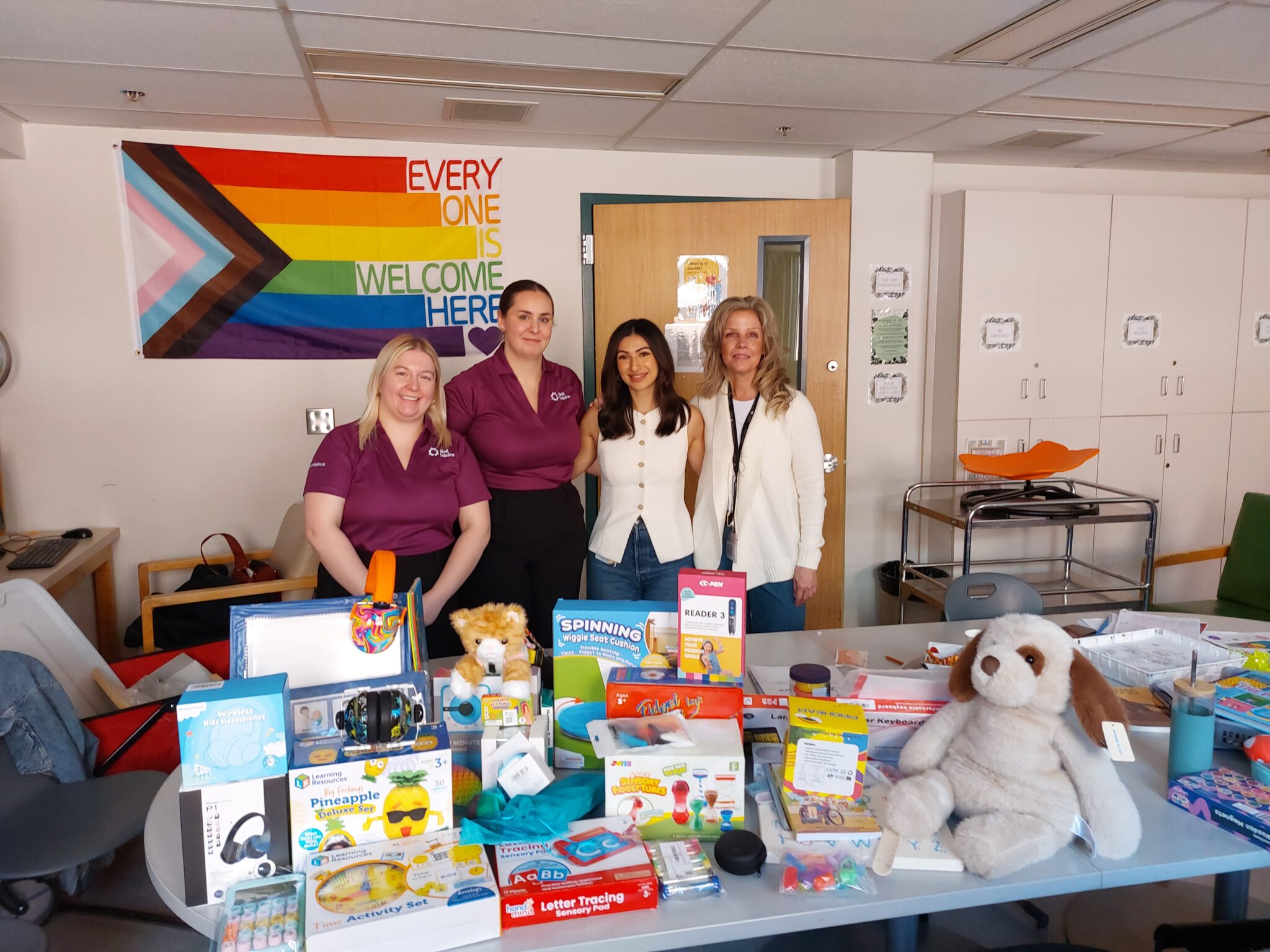 Chelsea, Amanda, and clinicians during a kit delivery.