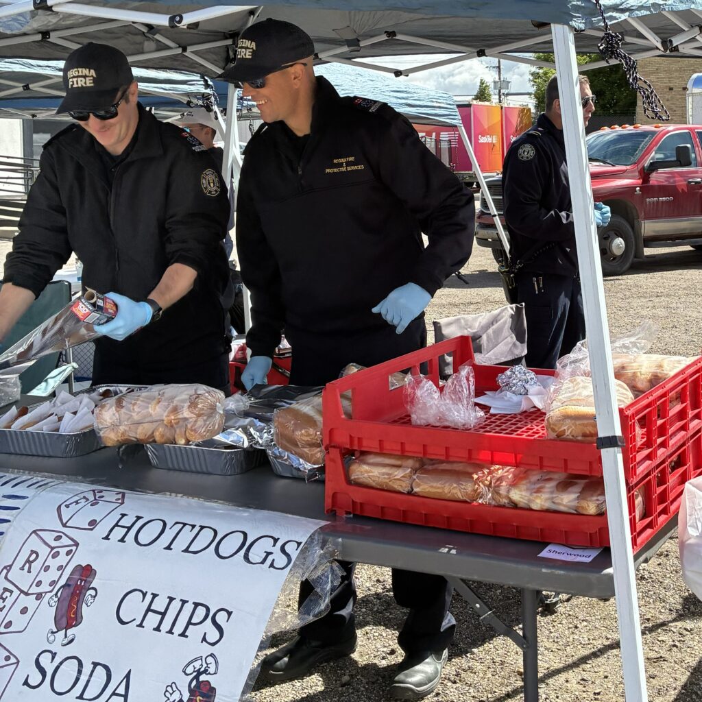 Firefighters prepare food.