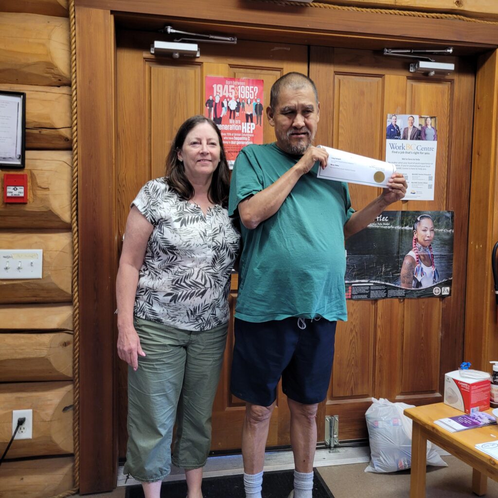 Vince with Mindy demonstrating his 10 years certificate.