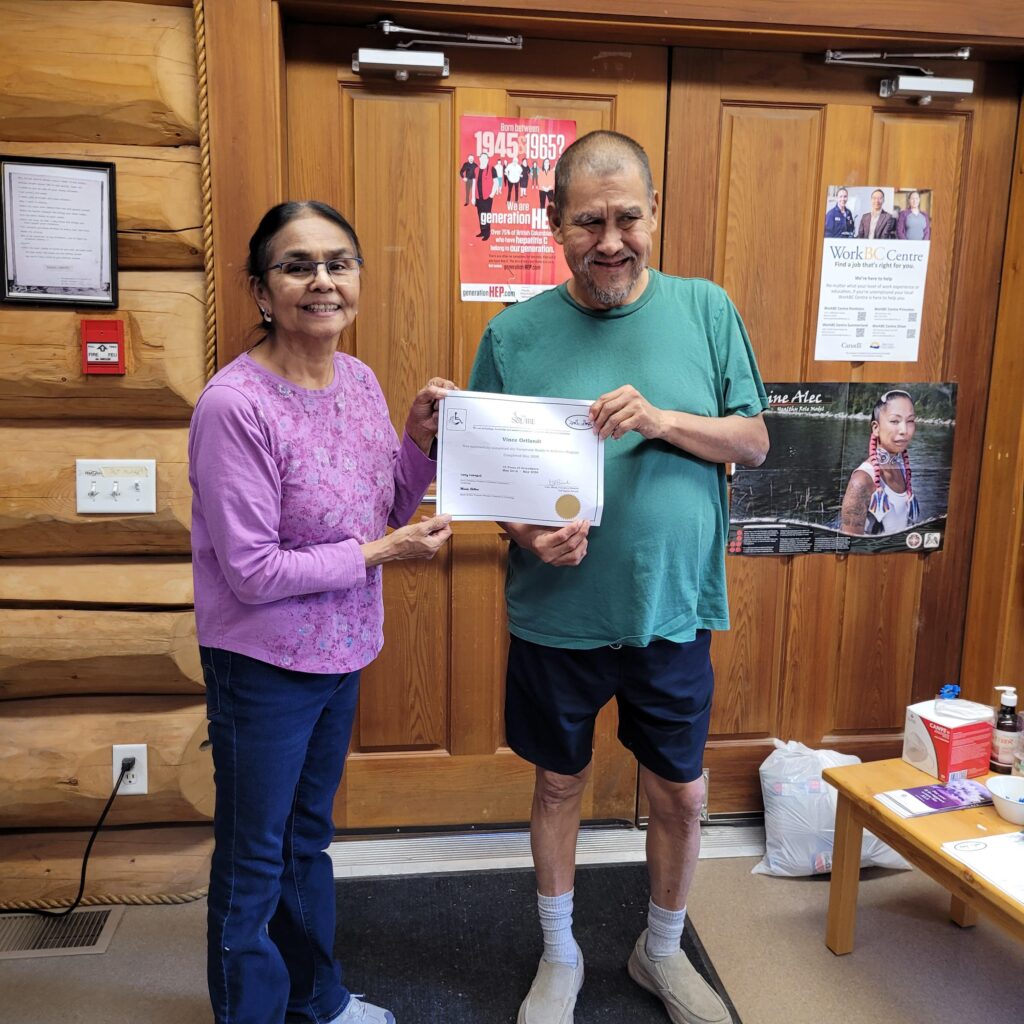 Vince with Terry demonstrating his 10 years certificate.