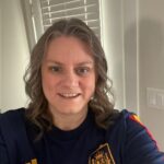 WorkBC Assistive Technology Services participant Mandy wearing a soccer jersey.