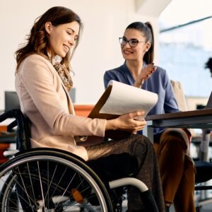 Person with a disability sitting at a table