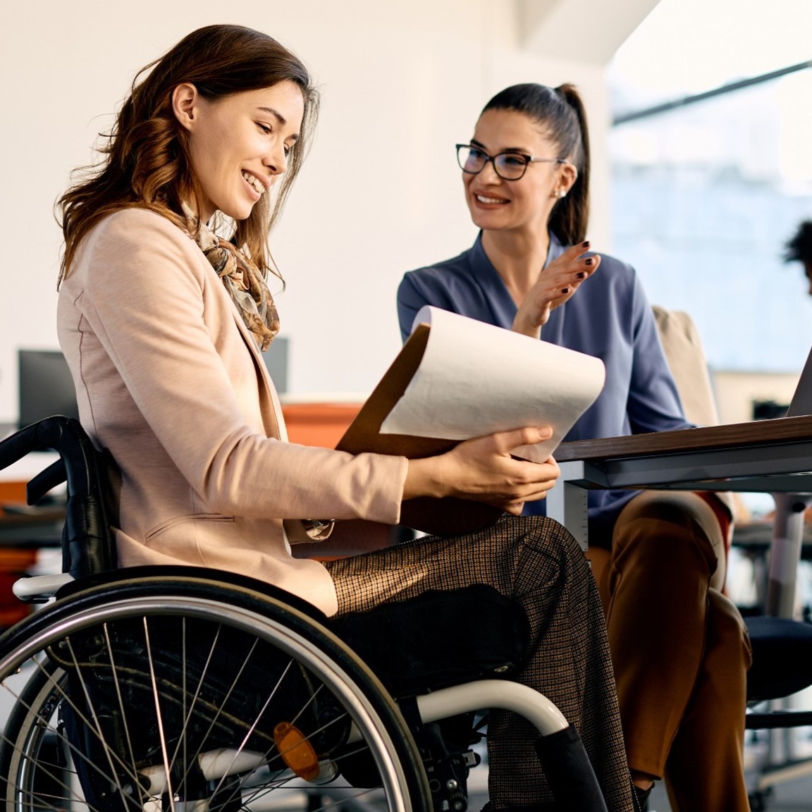 Person with a disability sitting at a table