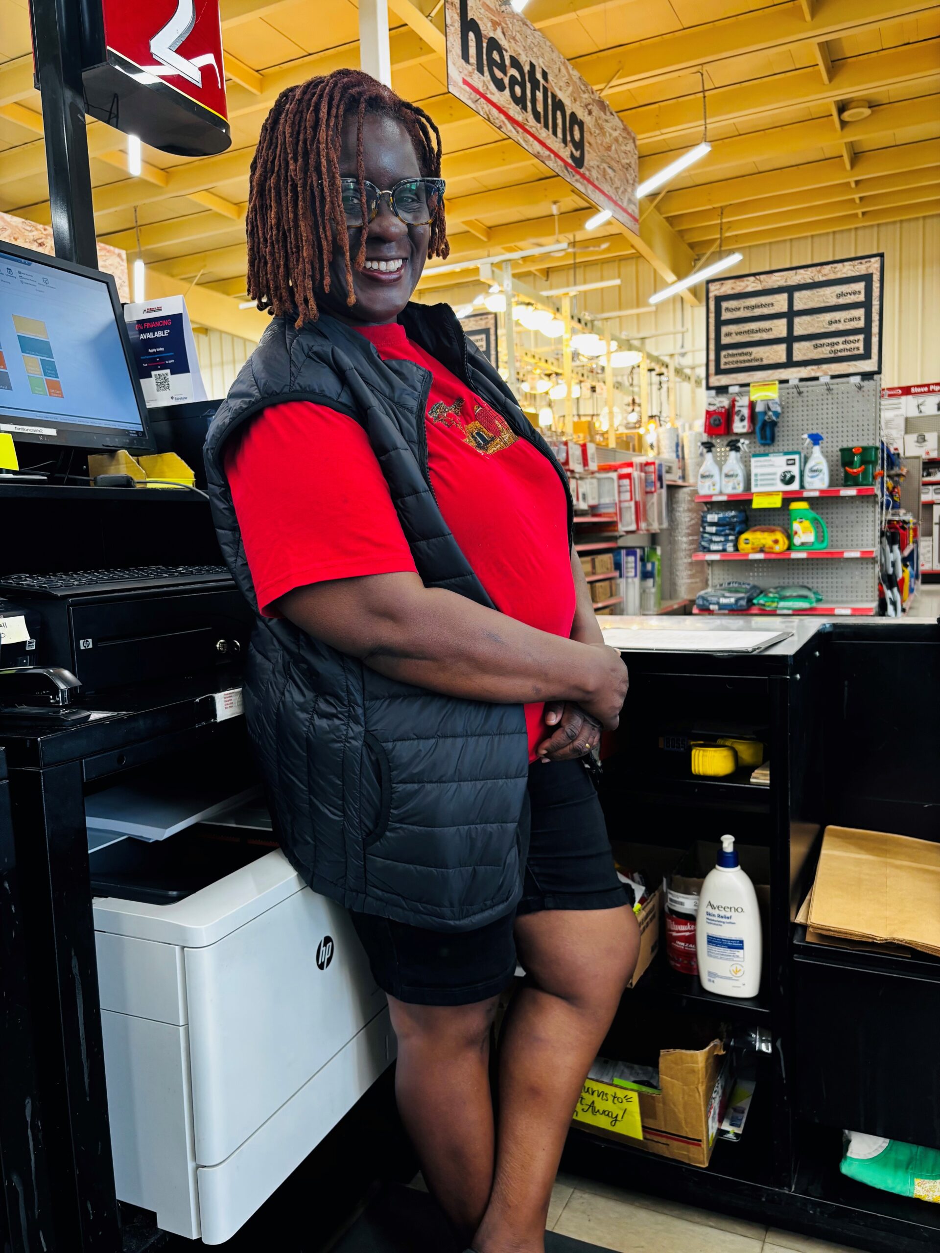 Viola at work as a cashier in a hardware store.