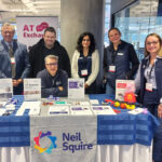 The Neil Squire team at the Neil Squire table.